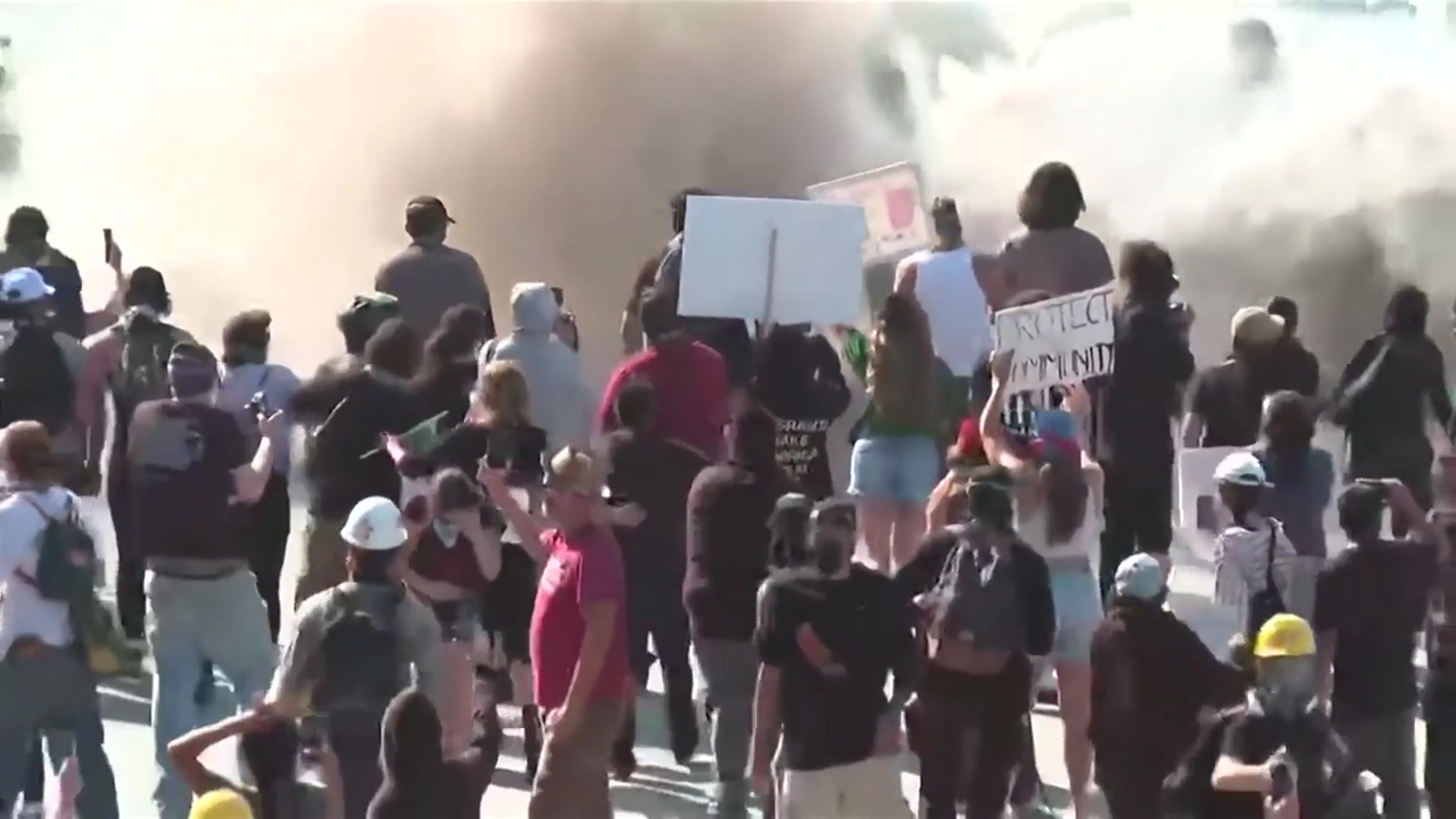 'Video thumbnail for WATCH: Los Angeles riot police clash with demonstrators in mass protest against immigration crackdown'