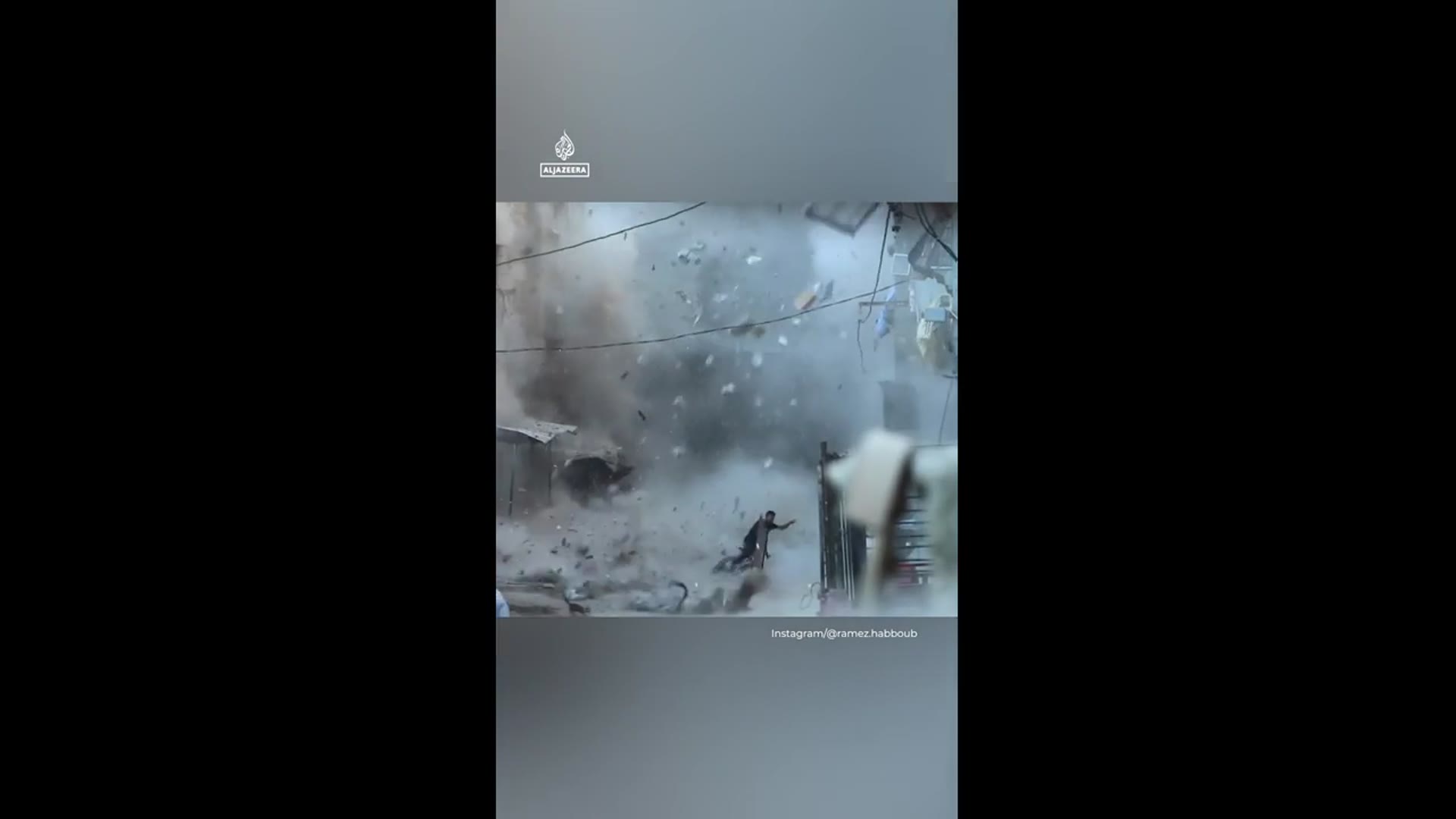 'Video thumbnail for Palestinian on bike tries to flee falling debris in Gaza from Israeli strike'