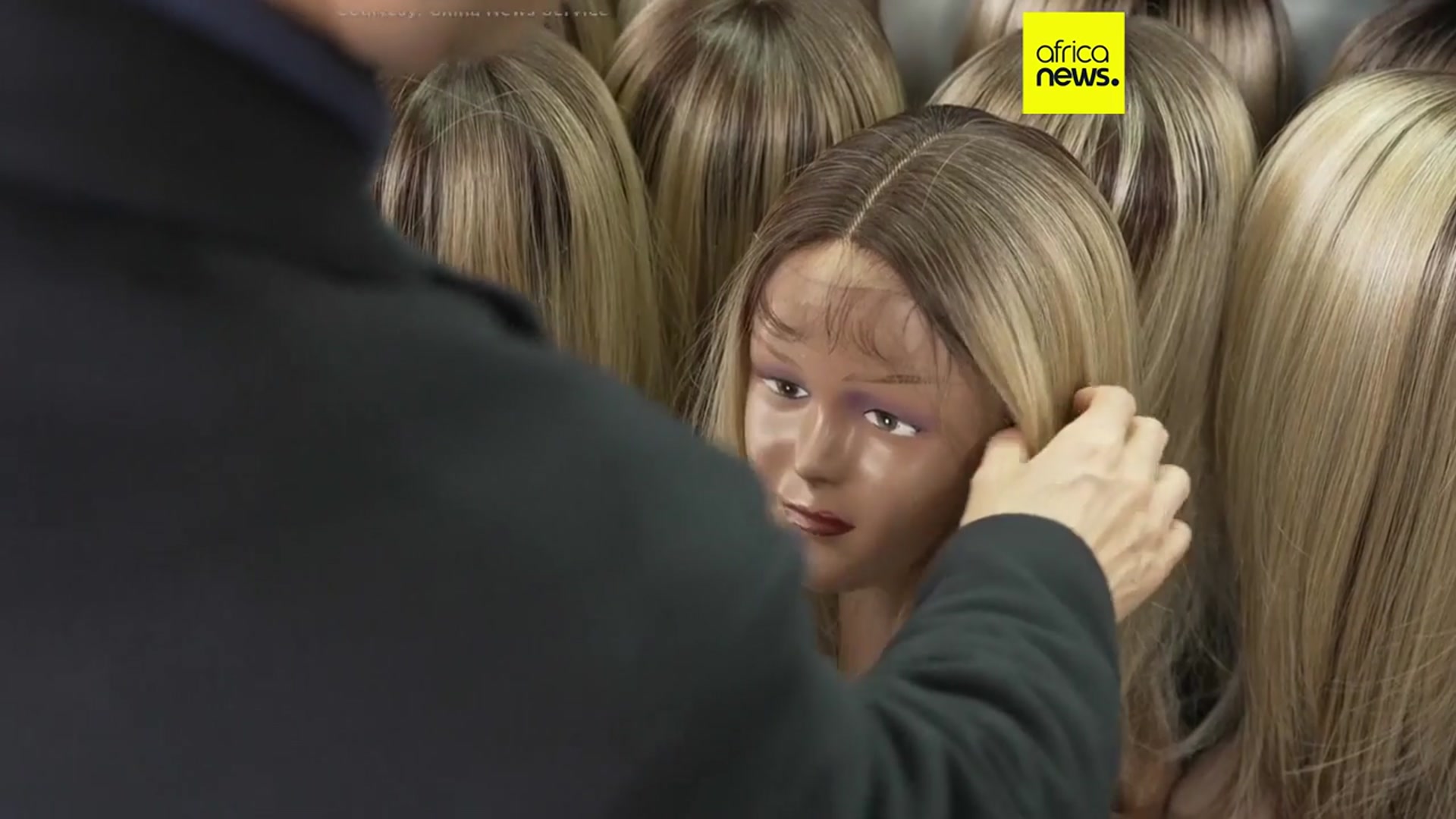 'Video thumbnail for Chinese city of Xuchang is world's biggest producer of wigs'