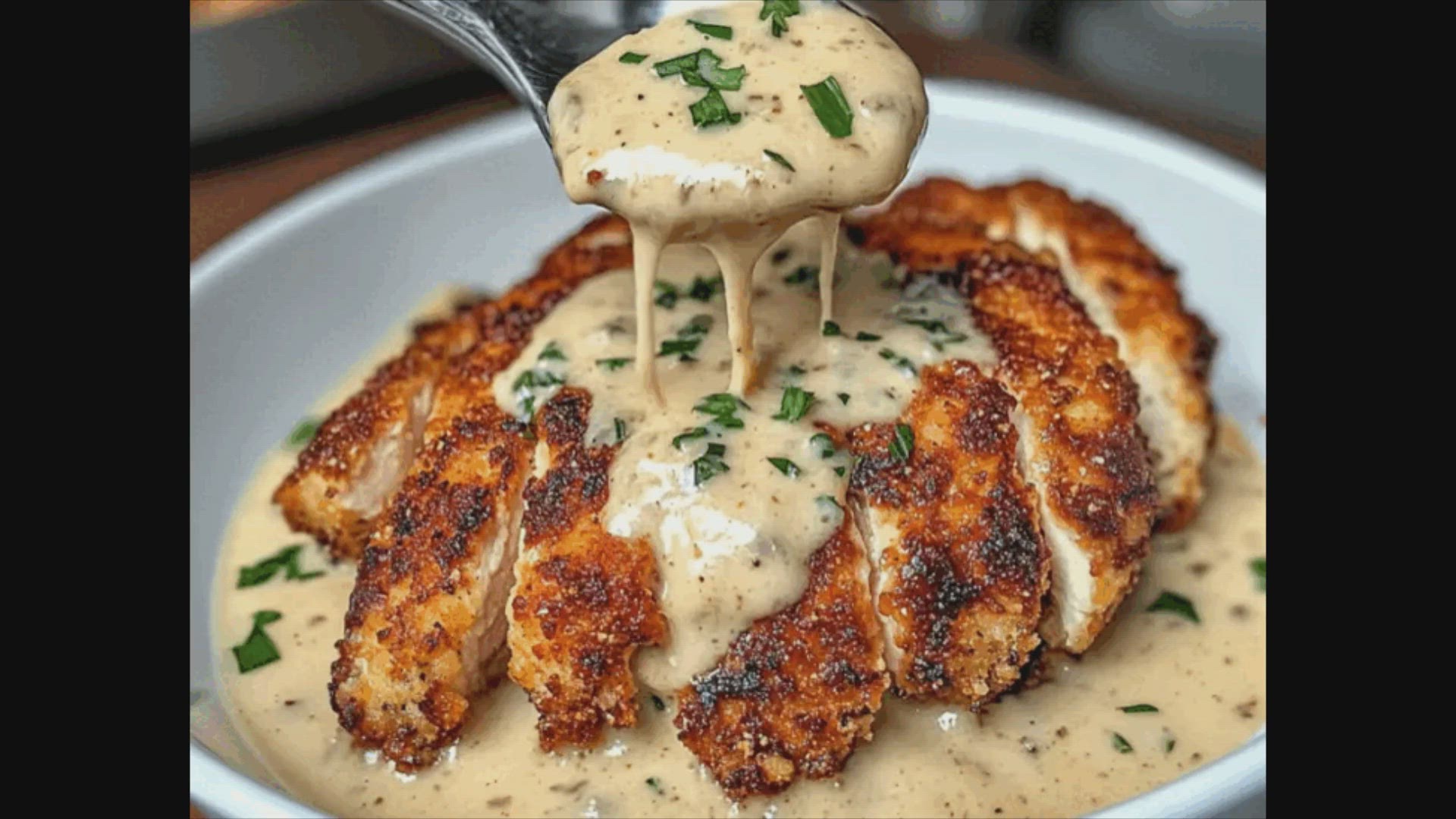 Video thumbnail for Parmesan Crusted Chicken with Creamy Garlic Sauce Recipe
