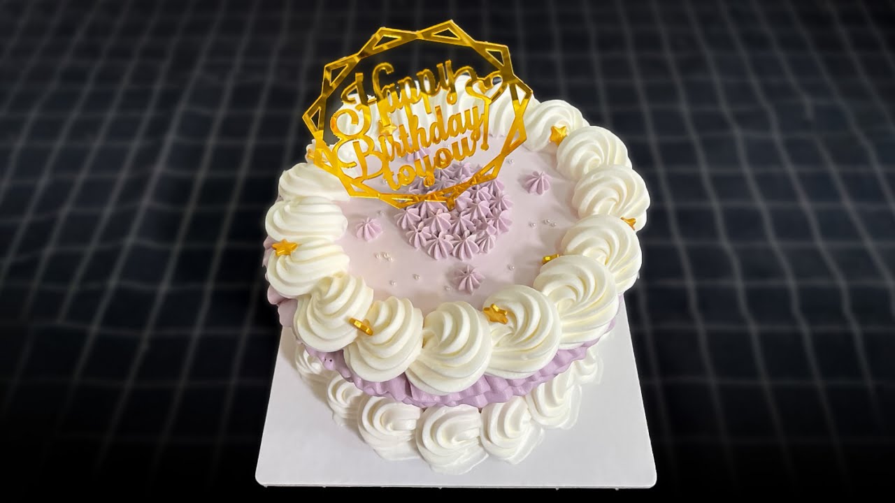 Video thumbnail for Purple birthday cake decoration for baby
