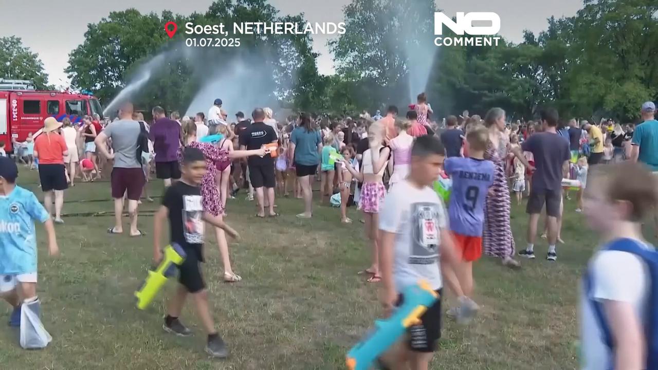 'Video thumbnail for Dutch town cools down with firefighter-led water fight'