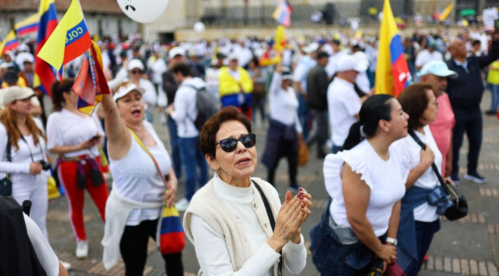 'Video thumbnail for Colombians march in silence to protest political violence after senator's shooting'