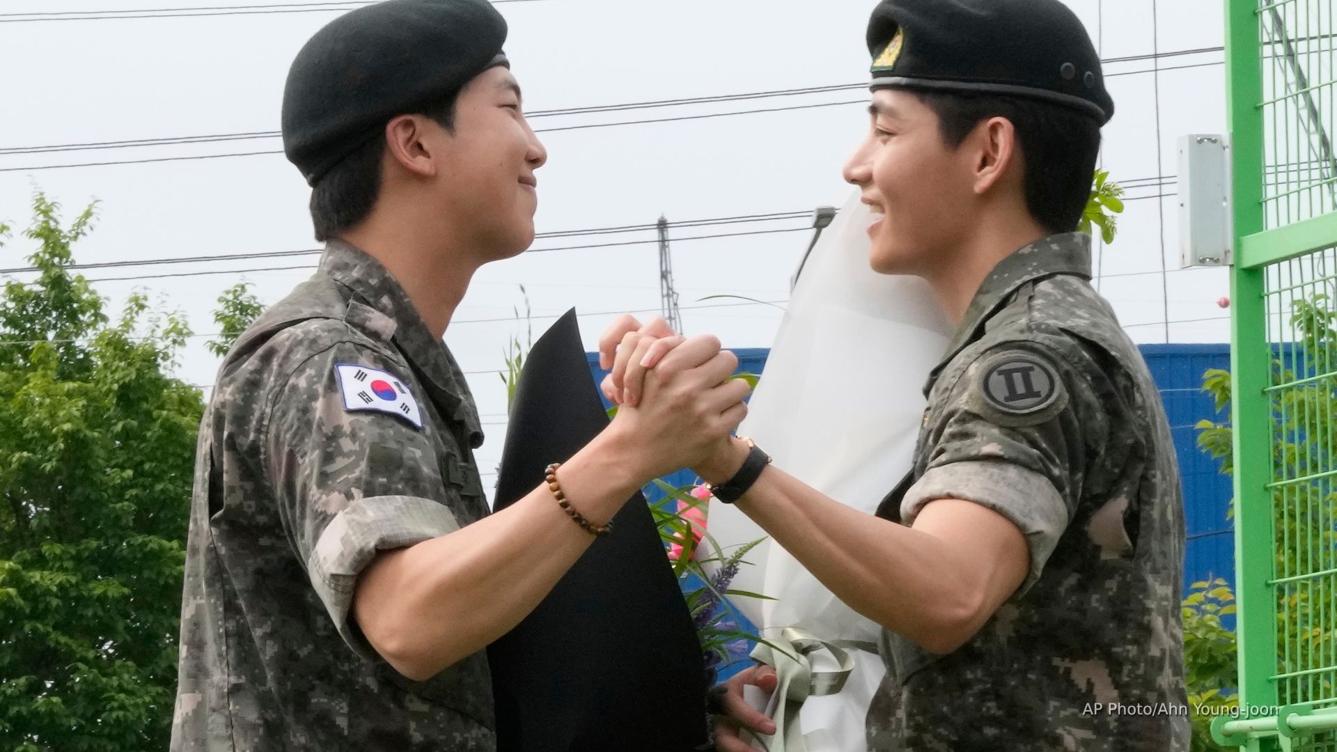 'Video thumbnail for BTS nears reunion as 2 more members finish mandatory S. Korea military service'