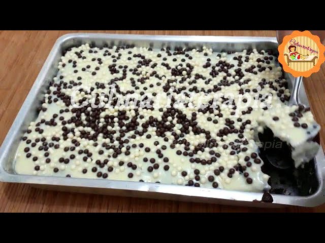 'Video thumbnail for BOLO DE CHOCOLATE FÁCIL E RÁPIDO COM COBERTURA CREMOSA DE LEITE NINHO - BOLO CHOCONINHO'