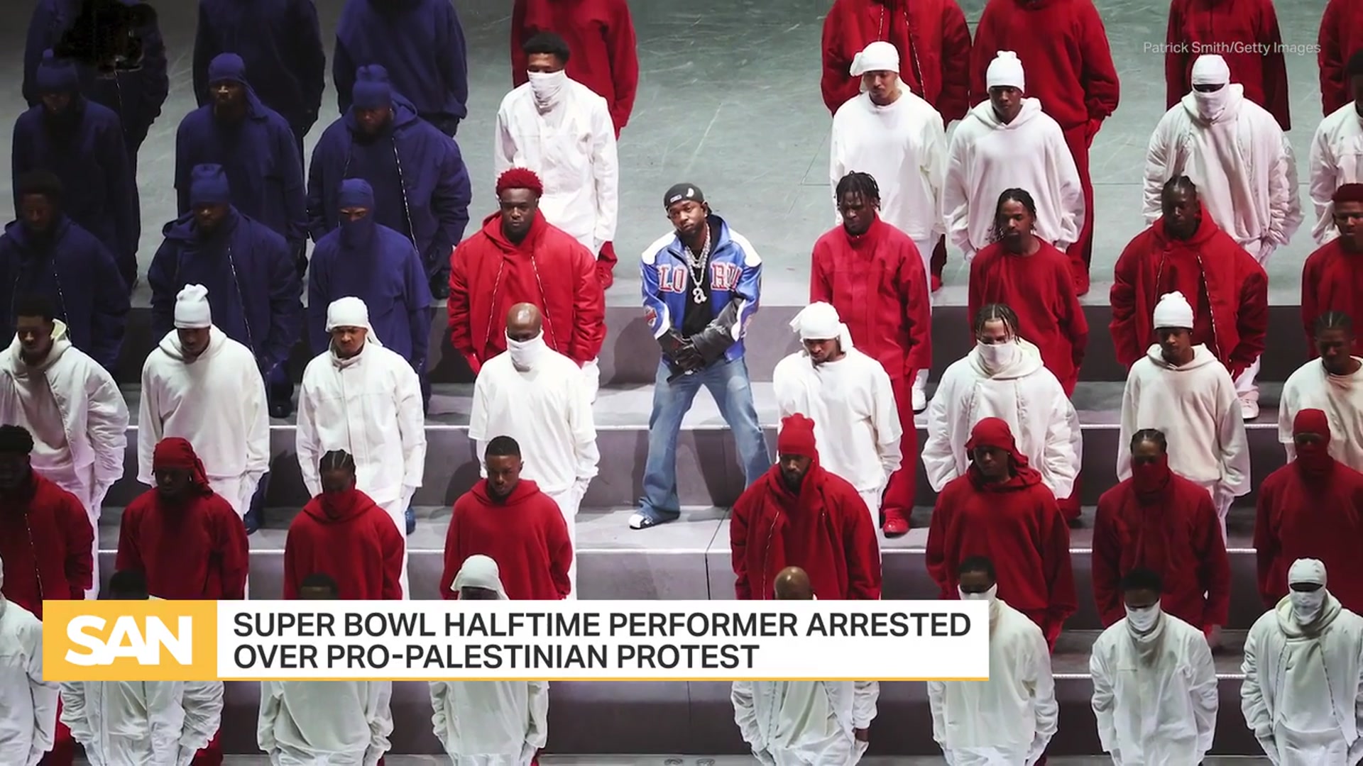 'Video thumbnail for Super Bowl performer who waved ‘Sudan and Free Gaza’ flag at halftime arrested'