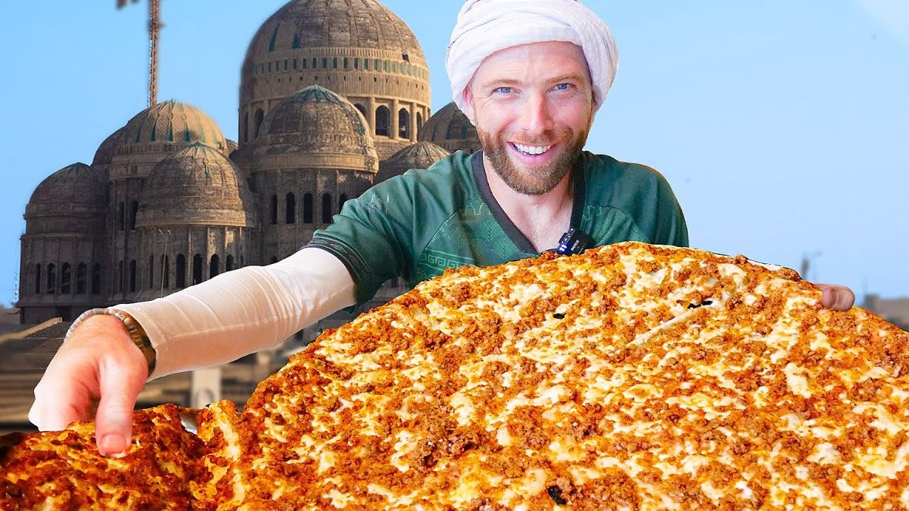 'Video thumbnail for IRAQI PIZZA Lahm Bi Ajeen!! STREET FOOD MASTERS in Mosul, Iraq!!'