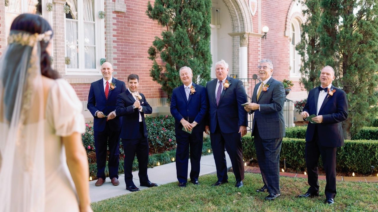 Video thumbnail for Bride Who Lost Dad Ten Years Ago Has Emotional First-Look At Wedding With All The Men In Her Life