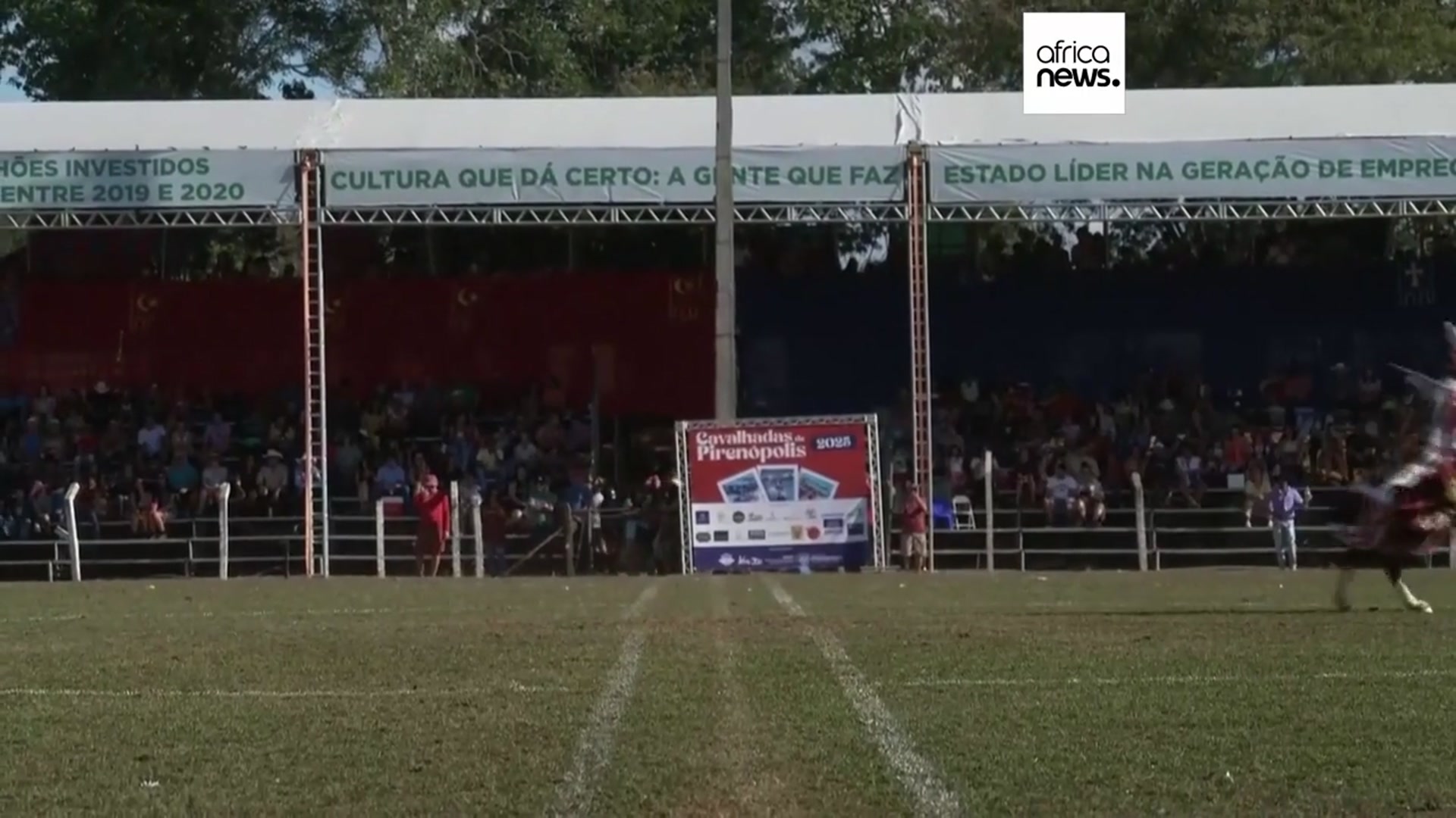 'Video thumbnail for In Brazil, knights and masked riders take to a football pitch for religious festival'