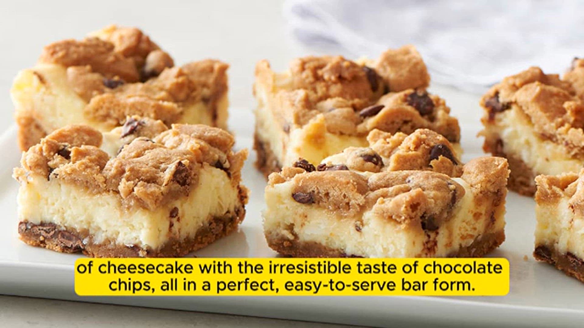 'Video thumbnail for Melt-in-Your-Mouth Chocolate Chip Cheesecake Bars'